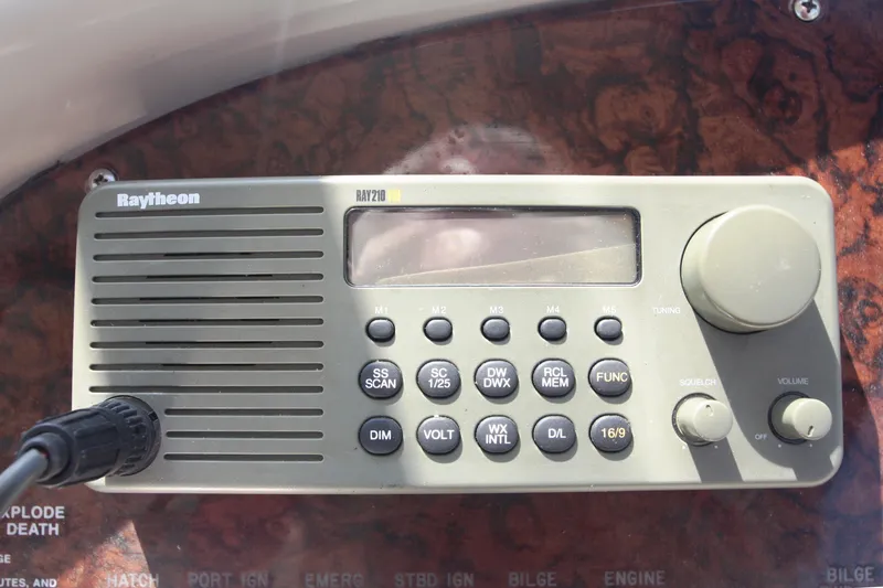 Slide: The Image of Raytheon marine radio on 1999 Sea Ray 380 Sundancer dashboard. - 38