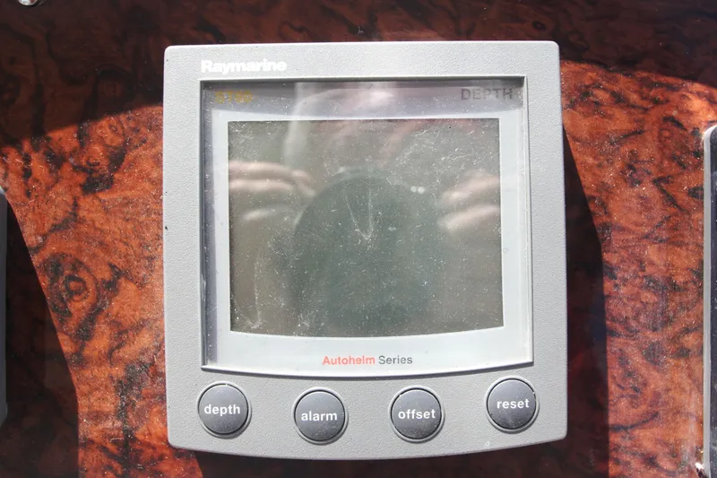 Slide: The Image of Raymarine depth gauge on 1999 Sea Ray 380 Sundancer boat dashboard. - 37