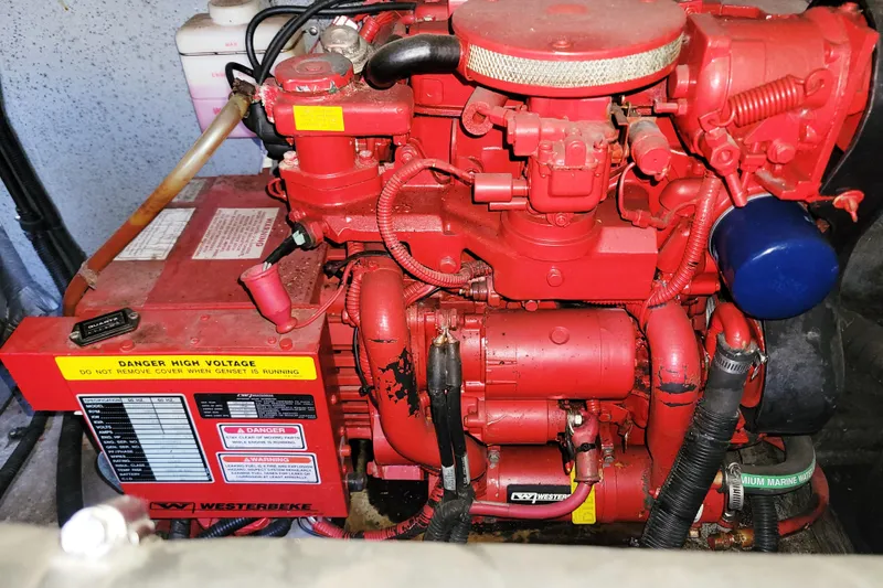 Slide: The Image of Red marine engine in a 1999 Sea Ray 380 Sundancer boat. - 74
