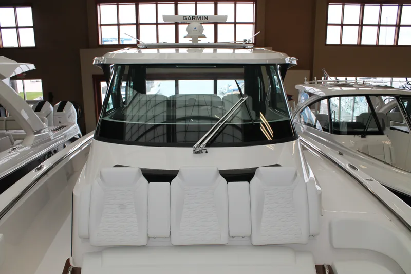 Slide: The Image of 2027 Tiara Yachts 46 LS luxury boat with sleek design and modern features. - 14