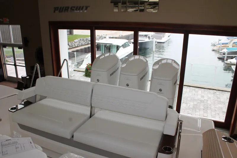 Slide: The Image of Luxurious 2027 Tiara Yachts 46 LS interior with waterfront view and powerful Mercury engines. - 4