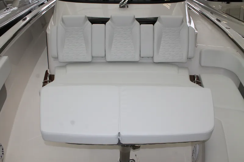 Slide: The Image of Luxurious seating on 2027 Tiara Yachts 46 LS, featuring elegant white upholstery. - 15