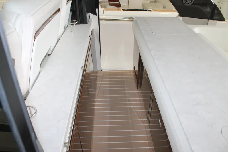 Slide: The Image of Interior view of 2027 Tiara Yachts 46 LS, featuring sleek countertops and modern design. - 6