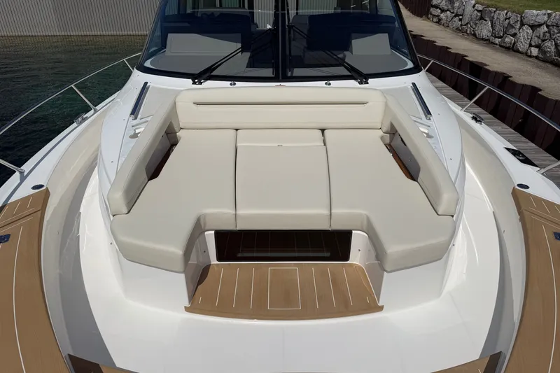 Slide: The Image of Luxurious seating area on 2027 Tiara Yachts EX 54, featuring elegant design and comfort. - 44