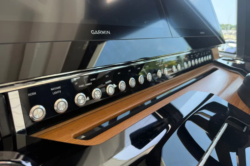 Slide: The Image of Control panel of 2027 Tiara Yachts EX 54 with Garmin navigation system. - 22