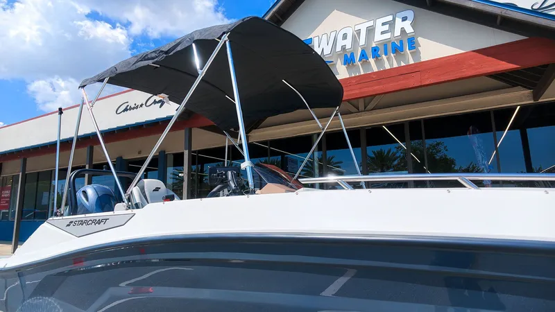 Slide: The Image of Starcraft SV 18 OB from 2027 in front of a marine store. - 2