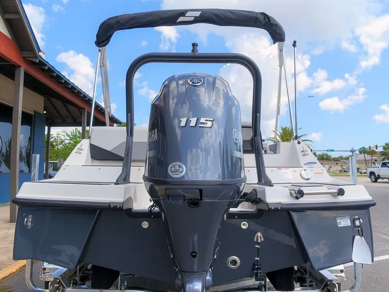 Slide: The Image of The image shows the rear of a Starcraft SV 18 OB boat with a Yamaha 115 outboard motor. - 3