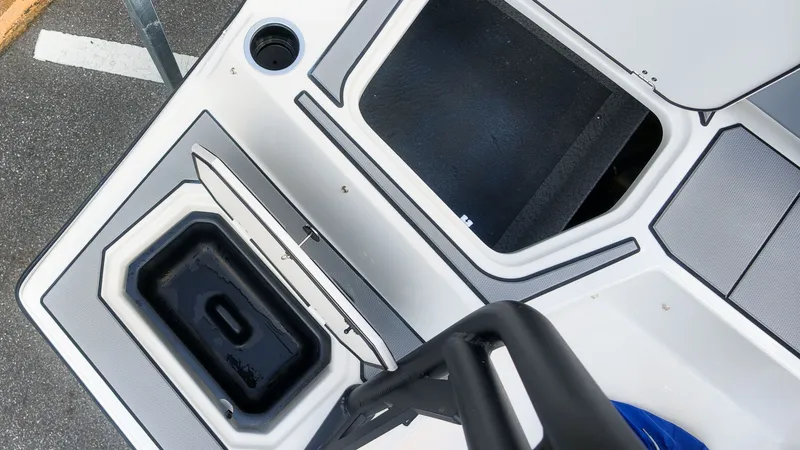 Slide: The Image of Close-up of the 2027 Starcraft SV 18 OB showing storage compartments and fittings. - 4