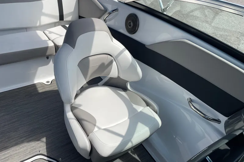 Slide: The Image of Interior of 2020 Four Winns H190 boat featuring a sleek, modern seat design. - 11