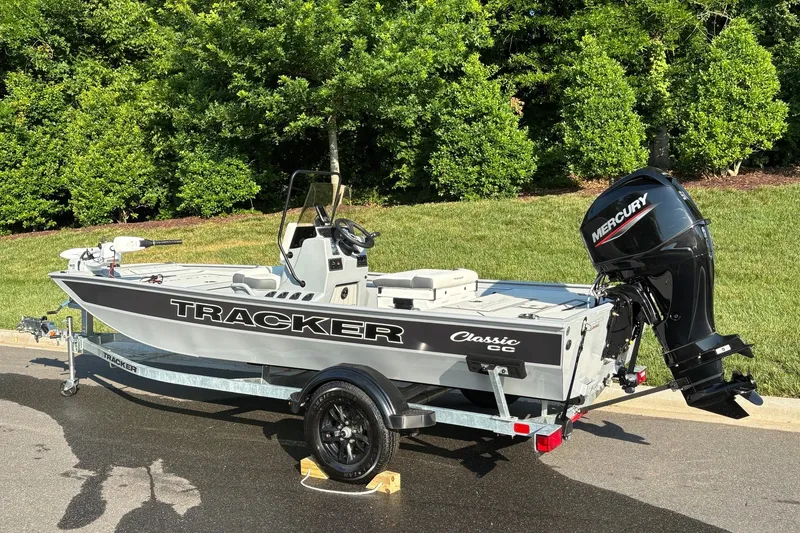 Slide: The Image of 2026 Tracker Bass Tracker Classic CC boat with Mercury engine on trailer. - 3