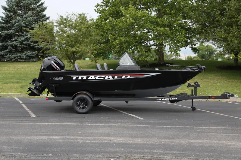 The Image of 2026 Tracker Pro Guide V-175 WT boat on trailer, parked outdoors. - 0
