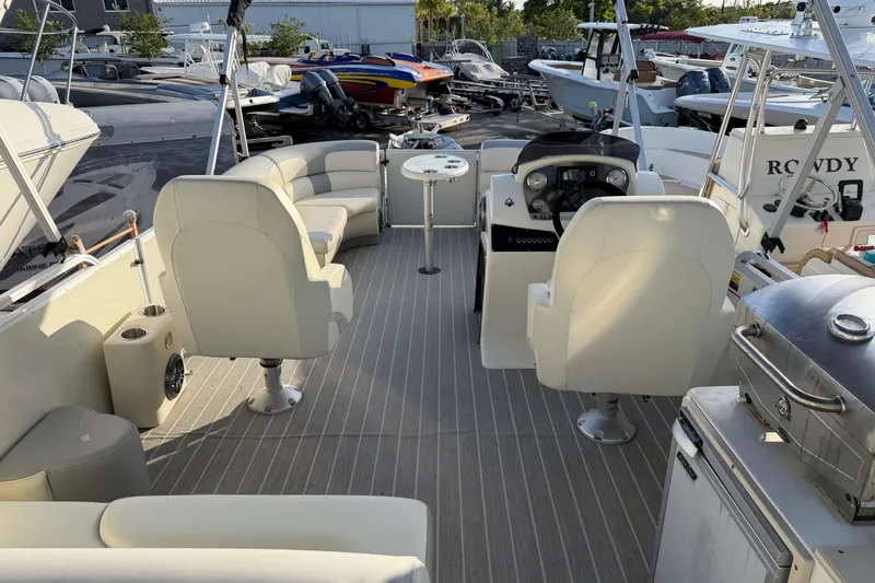 Slide: The Image of Luxurious 2021 Lexington 521 5 Series boat interior with plush seating and modern amenities. - 3