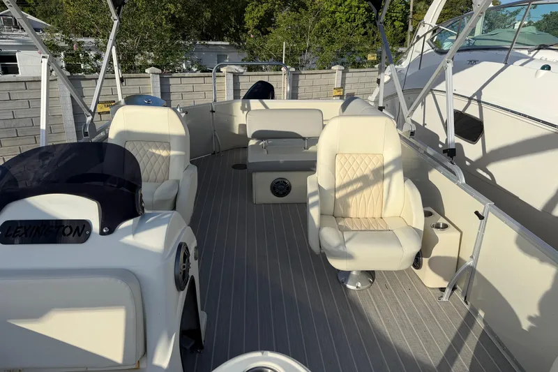 Slide: The Image of Luxurious 2021 Lexington 521 5 Series boat interior with plush seating and modern design. - 11