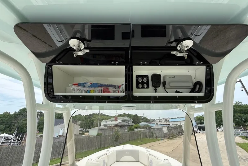 Slide: The Image of 2023 Key West 263 FS boat console storage with Garmin electronics and accessories. - 15