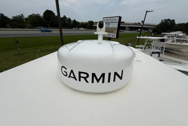 Slide: The Image of 2023 Key West 263 FS boat with Garmin radar on deck. - 29