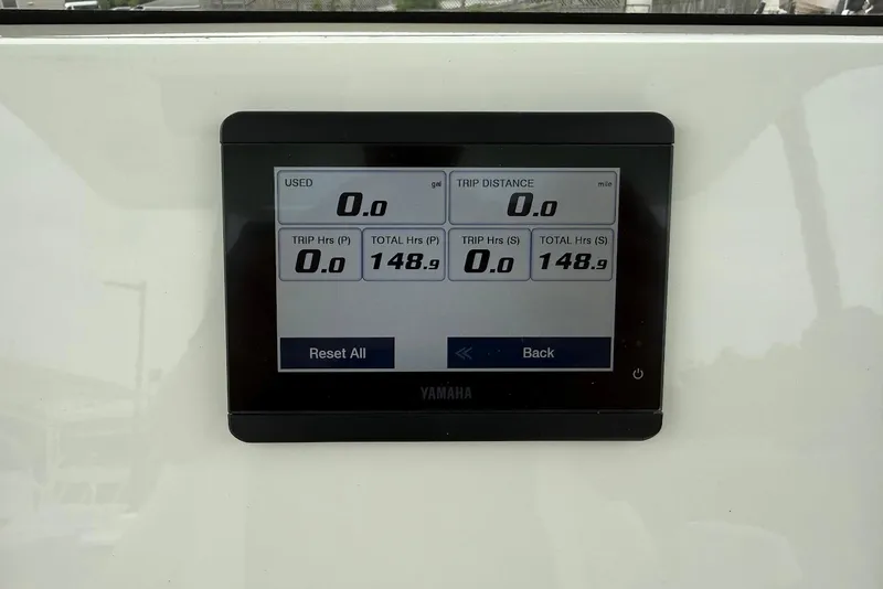 Slide: The Image of Yamaha display on 2023 Key West 263 FS boat showing trip and fuel data. - 17