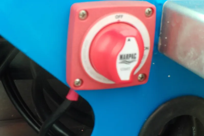 Slide: The Image of Red battery switch on 2025 Stabicraft 1450 Frontier boat. - 8