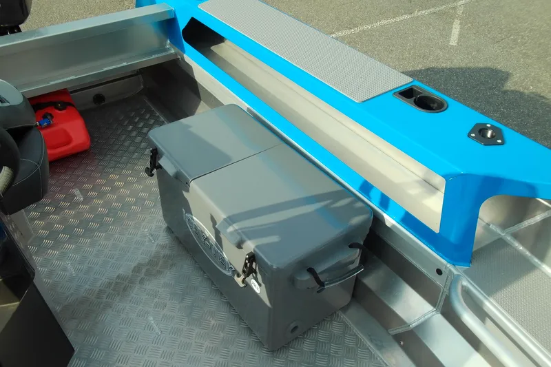 Slide: The Image of 2025 Stabicraft 1450 Frontier interior with storage box and aluminum flooring. - 10