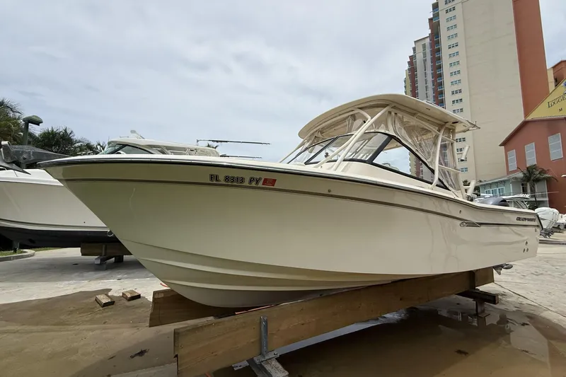 The Image of 2015 Grady-White Freedom 275 boat on display, featuring sleek design and sturdy construction. - 0