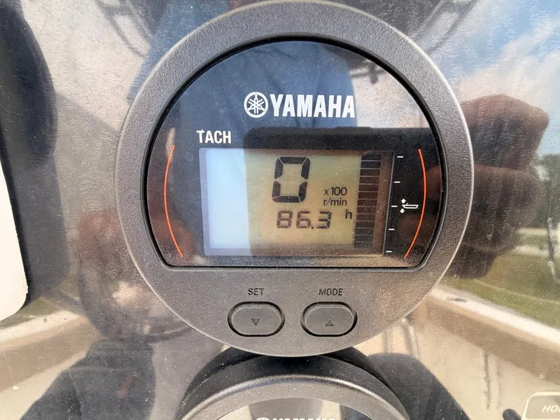 Slide: The Image of A Yamaha tachometer displays 86.3 operating hours. - 14
