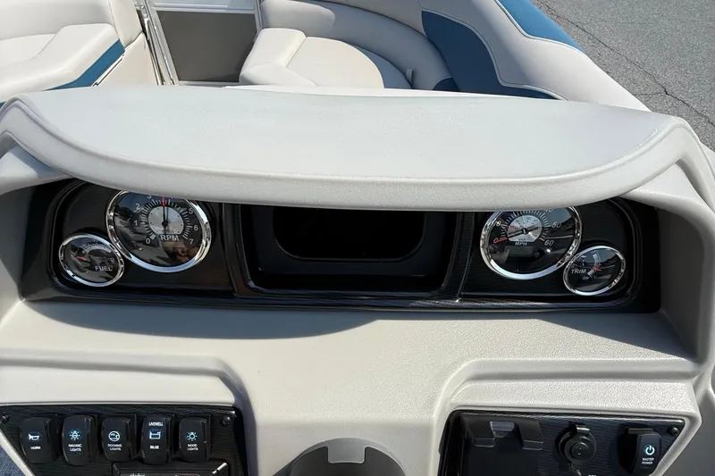 Slide: The Image of Dashboard of 2026 Berkshire 22RFX LE boat with gauges and controls. - 13