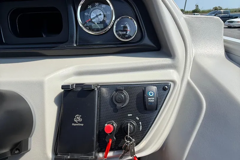 Slide: The Image of Dashboard of 2026 Berkshire 22RFX LE boat with gauges and controls. - 15