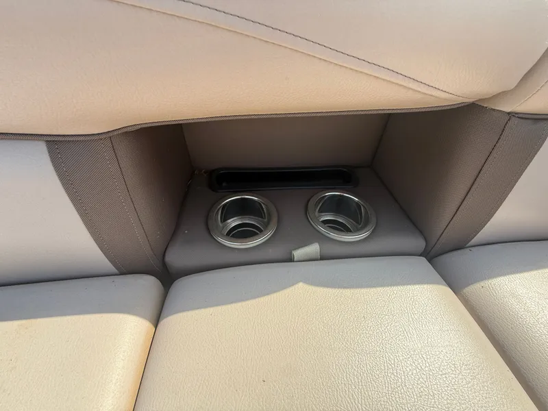 Slide: The Image of Close-up of two cup holders in a boat seat. - 21