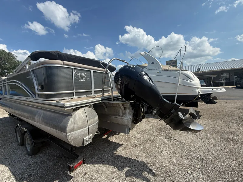 Slide: The Image of 2018 Harris 240 CXCS TRITOON on a trailer with an outboard motor. - 3