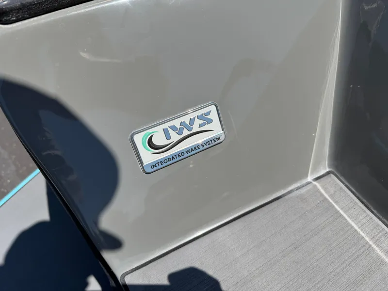 Slide: The Image of Close-up of a boat part with an "Integrated Wake System" logo. - 27