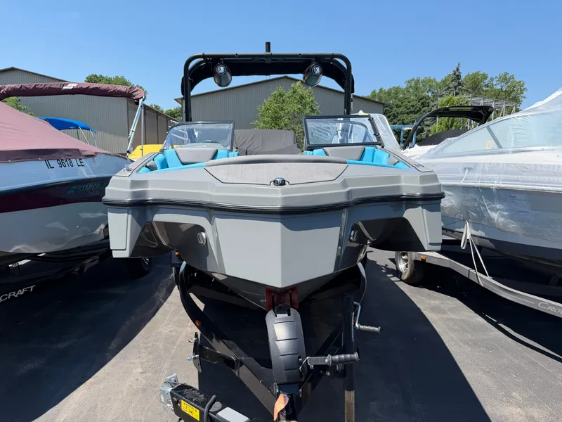 Slide: The Image of Heyday WT-2DC 2021 on a trailer, surrounded by other boats. - 1