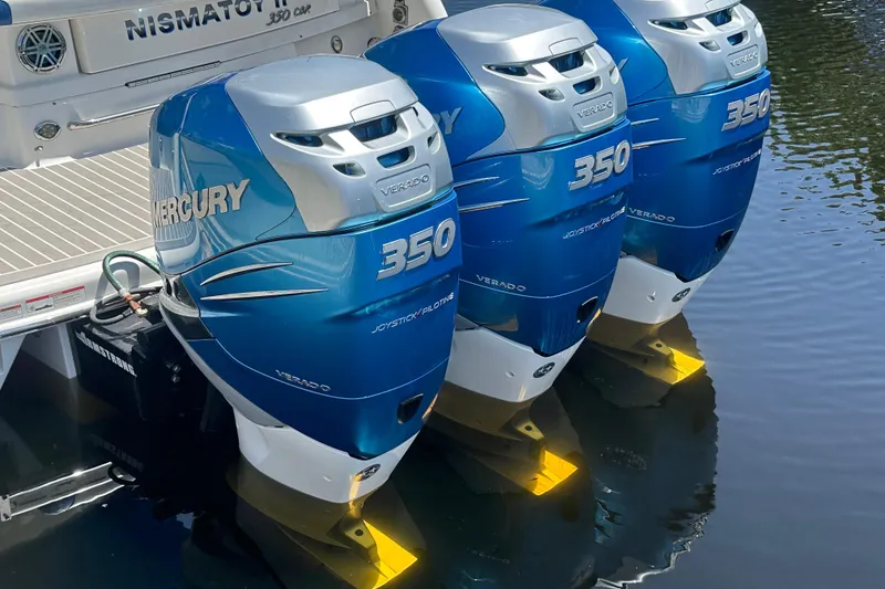 Slide: The Image of 2018 Formula 350 Crossover Bowrider OB with triple Mercury Verado 350 engines. - 10