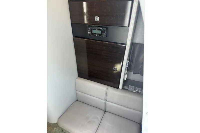 Slide: The Image of Interior of 2018 Formula 350 Crossover Bowrider OB with seating and control panel. - 35
