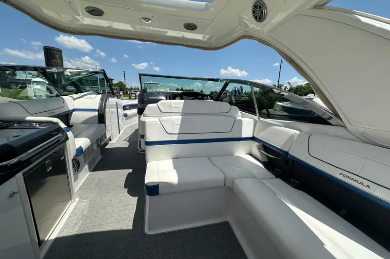 Slide: The Image of 2018 Formula 350 Crossover Bowrider OB interior with luxurious seating and modern amenities. - 25