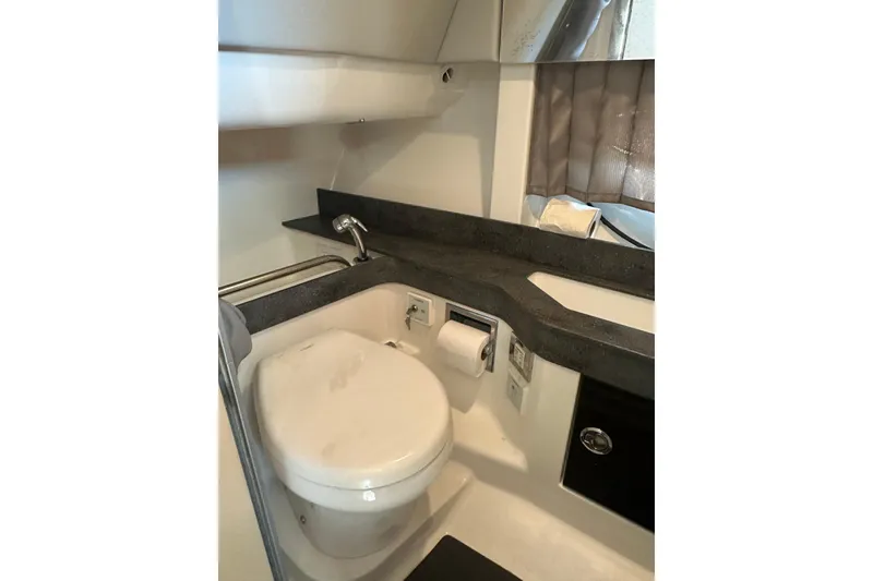 Slide: The Image of 2018 Formula 350 Crossover Bowrider OB bathroom with modern fixtures and sleek design. - 38
