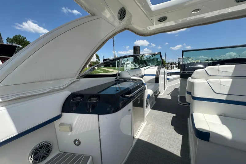 Slide: The Image of 2018 Formula 350 Crossover Bowrider OB interior with luxurious seating and modern amenities. - 26