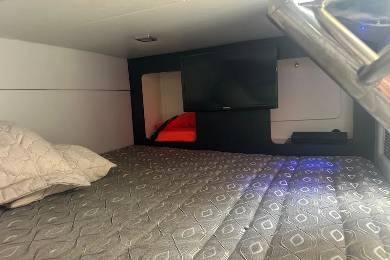 Slide: The Image of Interior cabin of 2018 Formula 350 Crossover Bowrider OB with bed and TV. - 36
