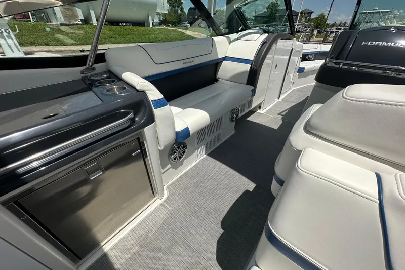 Slide: The Image of 2018 Formula 350 Crossover Bowrider OB interior with luxurious seating and modern amenities. - 33