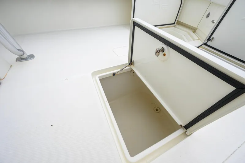 Slide: The Image of Open storage compartment on 2016 SeaVee 390Z boat deck. - 28