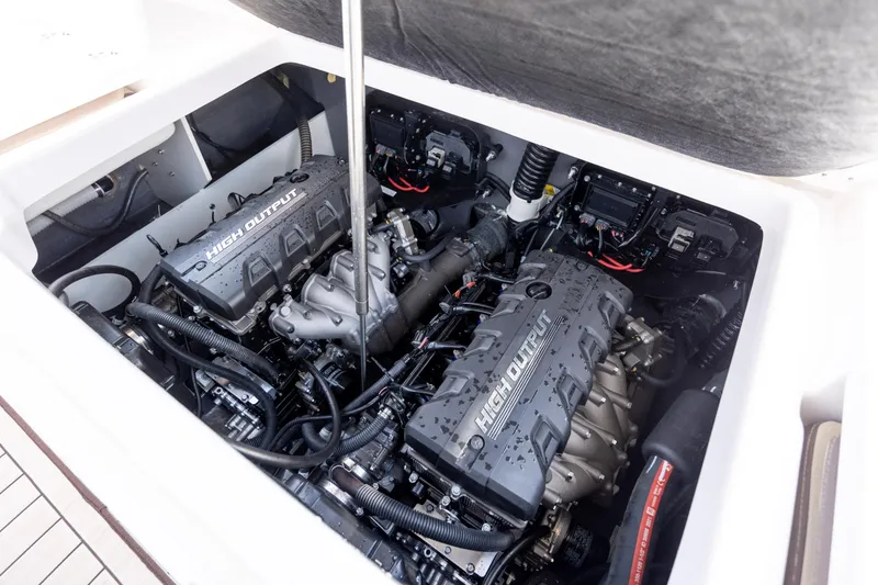 Slide: The Image of 2023 Yamaha Boats 222 FSH Sport E engine compartment with high output engines. - 20