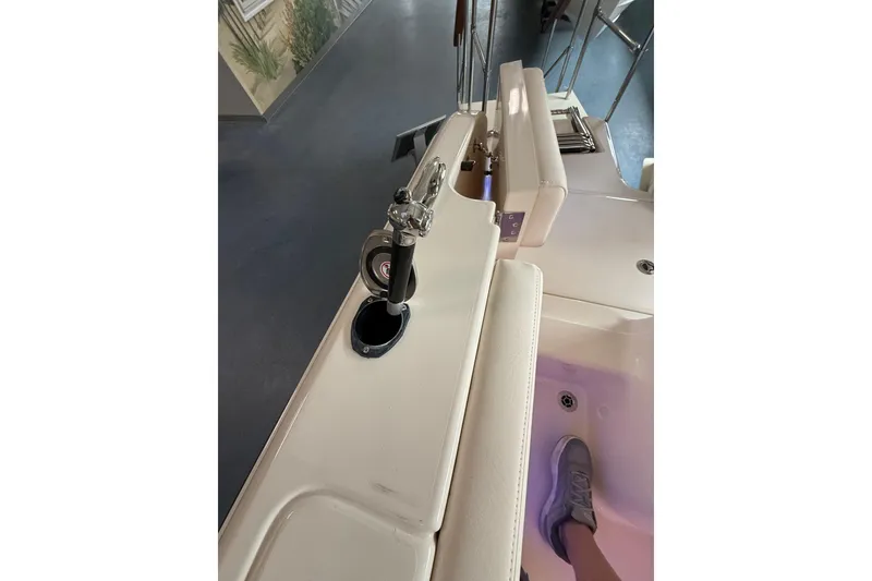 Slide: The Image of 2026 Grady-White Freedom 235 boat interior with seating and cup holder. - 36