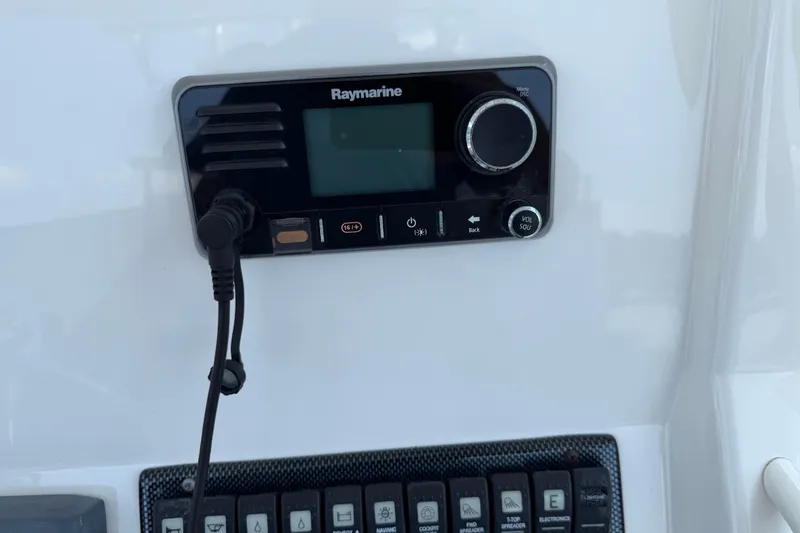 Slide: The Image of Raymarine control panel on 2015 Regulator 23 Center Console boat dashboard. - 19