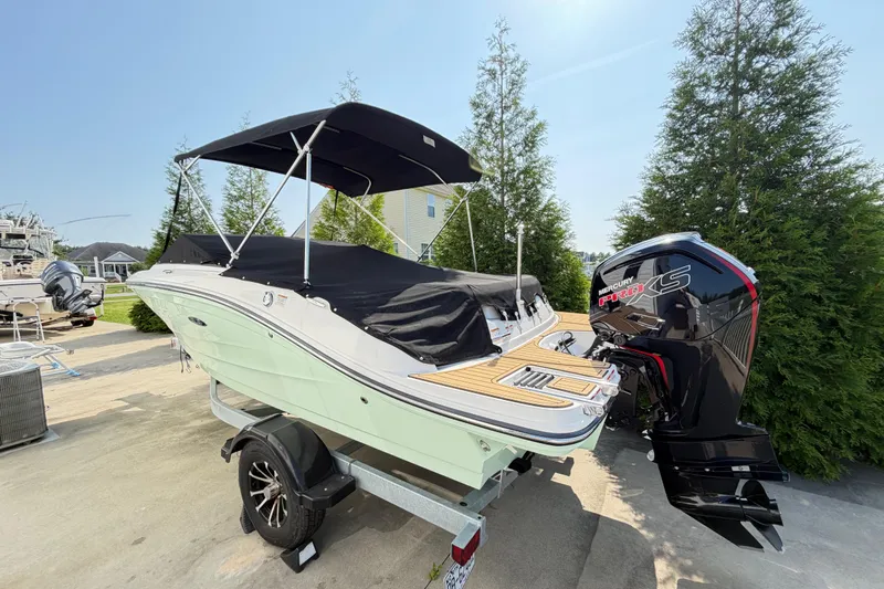 Slide: The Image of 2024 Sea Ray SPX 190 Outboard boat with Mercury Pro XS engine, parked outdoors. - 3