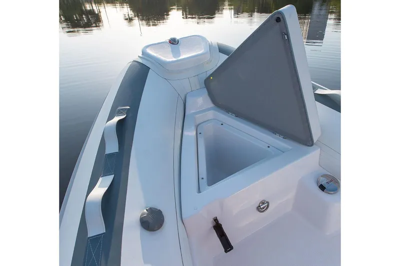 Slide: The Image of Manufacturer Provided Image: Novurania DL 335 boat 2026 with open storage compartment. - 1