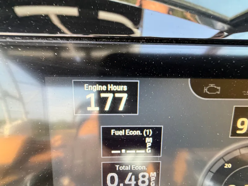 Slide: The Image of The display shows 177 engine hours and a fuel economy of 0.48 MPG. - 27