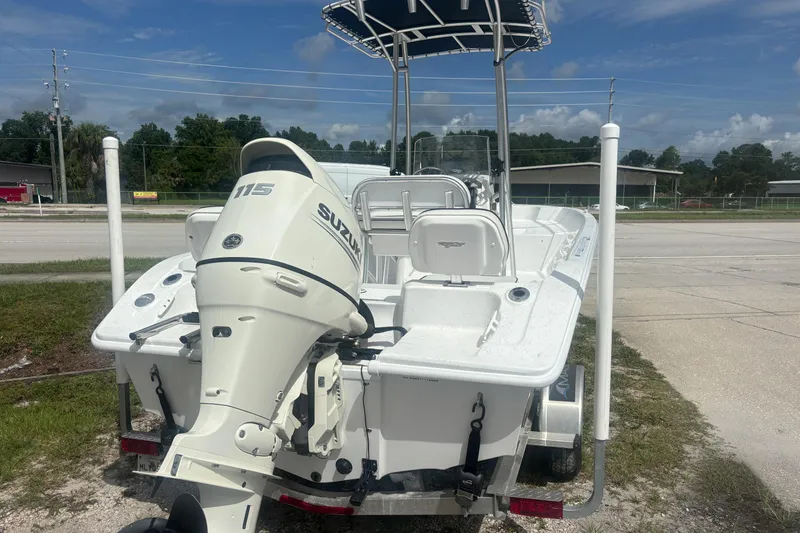 Slide: The Image of 2020 Glasstream 20 CCR boat with Suzuki 115 outboard motor, parked outdoors. - 6