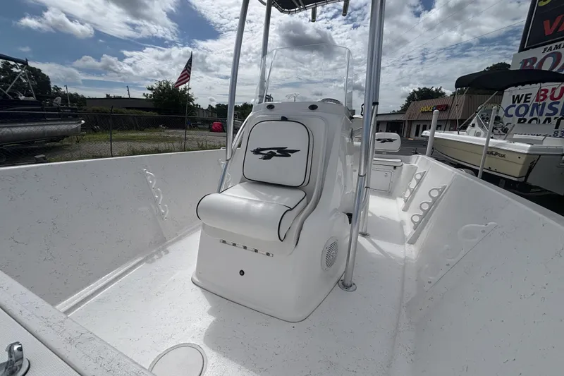 Slide: The Image of 2020 Glasstream 20 CCR boat with center console, white interior, and American flag in background. - 26