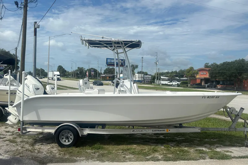 The Image of 2020 Glasstream 20 CCR boat on trailer, parked roadside under cloudy sky. - 0