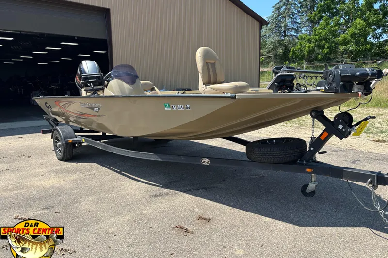 The Image of 2021 G3 Sportsman 1810 boat on trailer outside a garage. - 0