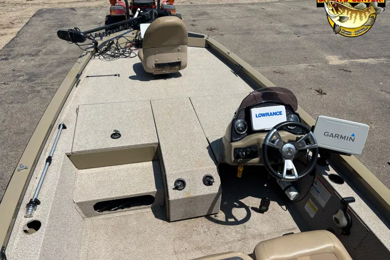 Slide: The Image of 2021 G3 Sportsman 1810 boat interior with Garmin and Lowrance navigation systems. - 5