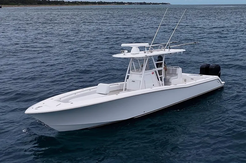 Slide: The Image of 2018 Invincible 33 Open Fisherman boat on open water. - 3